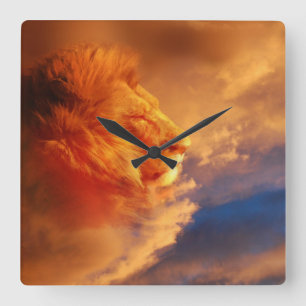 Proud male lion face in sunset clouds square wall clock