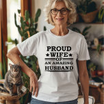proud wife of an amazing husband T-Shirt<br><div class="desc">Proud Wife of an Awesome Husband " is an original graphic design with awesome typography font lettering is a great birthday and holiday gift idea for all appreciated, special, and amazing husbands and wives! The best and most fun holiday present for your awesome wife. The best and most fun text...</div>