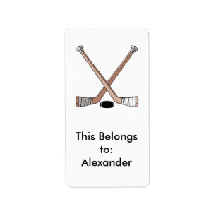 puck and hockey sticks design label