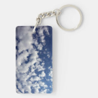 Puffy Clouds On Blue Sky