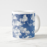 Puffy Clouds On Blue Sky
