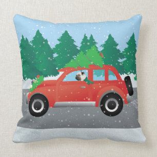 Pug Driving Car with Christmas Tree on Top Cushion