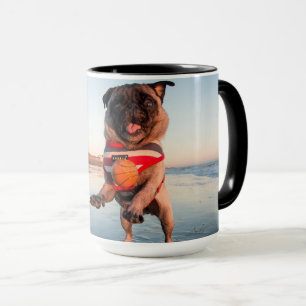 Pug Playing Ball on Beach Mug