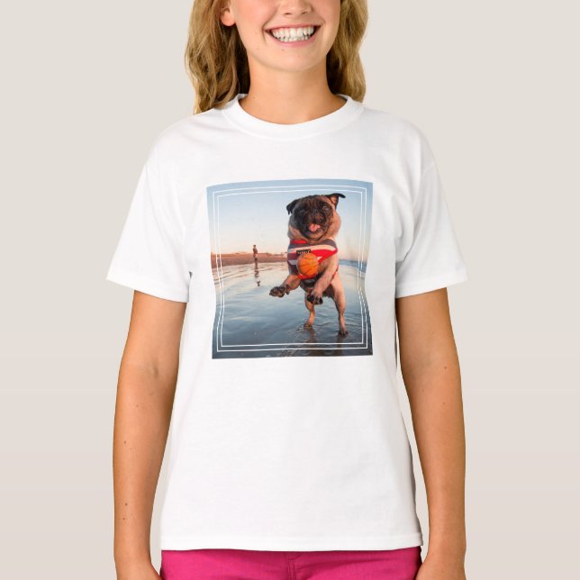 Pug Playing Ball on Beach T-Shirt (Front)