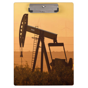 Pump Jack Pumping Oil In West Texas, USA Clipboard