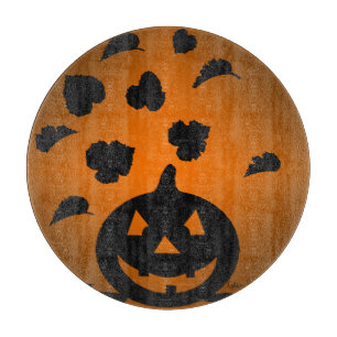 Pumpkin and Leaves Silhouette Cutting Board
