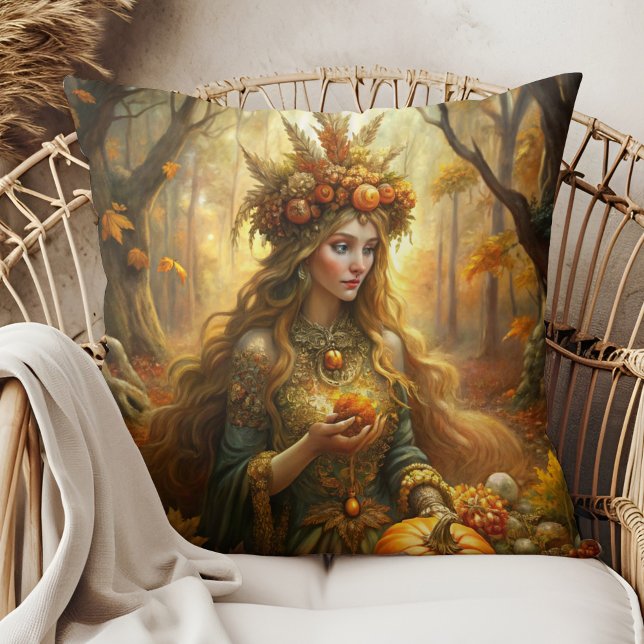 Pumpkin Witch Fairy – Cosy Autumn Witchcore Cushion (Pumpkin Witch Fairy – Cozy Autumn Witchcore Throw Pillow in a boho rattan armchair.)
