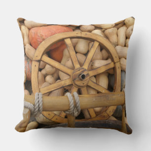 Pumpkins and Wheel of the rural wooden cart Cushion