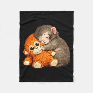 Punch the monkey cuddling stuffed animal meme fleece blanket