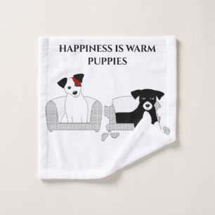 Puppies in bed wash cloth. wash cloth