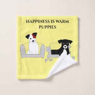 Puppies in bed wash cloth. wash cloth