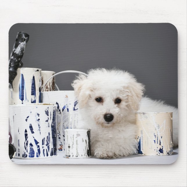 Puppy sitting amongst paint tins mouse pad (Front)
