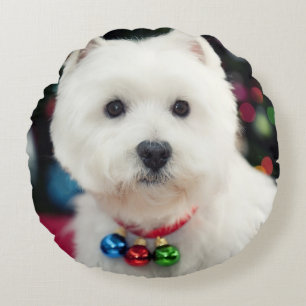 Puppy wearing Christmas bell on neck Round Cushion