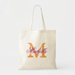Purple and orange monogram wedding tote bags<br><div class="desc">Purple and orange wedding tote bag with personalised monogram. Vintage chic style monogrammed design. Customise for brides entourage; bridesmaids, flower girls, maid of honour, mother of the bride, mother of the groom, team bride, guests etc. Elegant script typography for name. Rustic name initial. Also nice for girls weekend bachelorette or...</div>