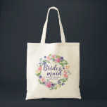 Purple and Pink Floral Personalised Bridesmaid Tote Bag<br><div class="desc">A beautiful wedding welcome gift for your bridesmaids. Pink and purple watercolor flowers look fabulous with the modern greenery. Bridesmaid is written in a flowing purple script. The bride's name wedding and the wedding date is below. All of the template text can be easily changed. You can also change the...</div>
