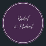 Purple and Silver Wedding Delight Classic Round Sticker<br><div class="desc">Truly a delight,  these purple and silver wedding stickers makes the perfect accessory for your celebratory needs.  Displayed upon a purple background,   the templates makes filling in the couple's name simple.  The names and border are displayed in silver colour.  Personalise your wedding stickers today!  

Wedding Sticker Design: WeddingsbyRhoadie</div>