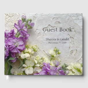 Purple and white flowers on old laces guest book