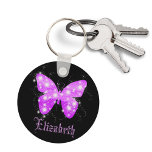 Purple butterfly and stars personalised with name key ring<br><div class="desc">A summery and feminine motive. A butterfly shape filled with shades of purple and shining stars in horizontal stripes.  Black background. Customise and add your name with purple letters.</div>