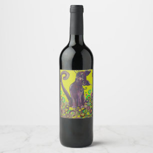 purple cat on yellow wine label