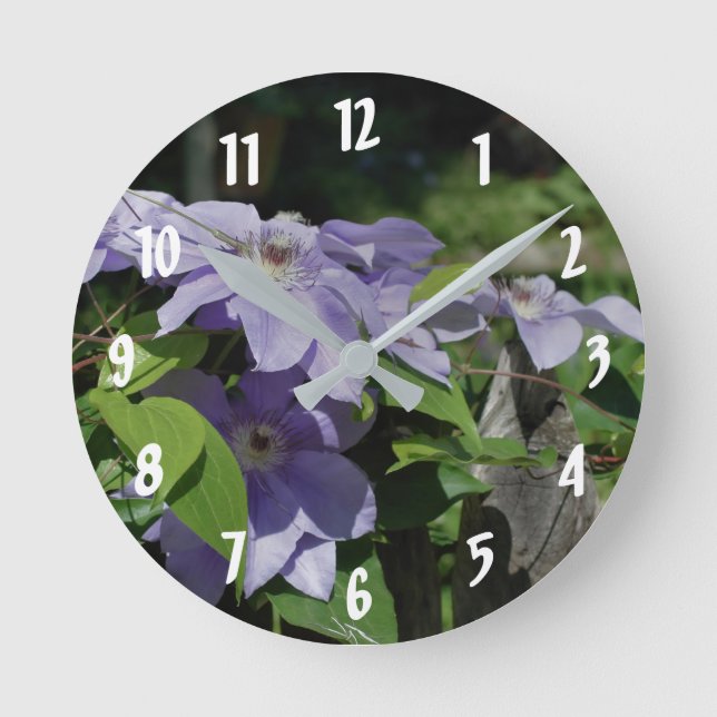 Purple Clematis Flowers On Fence Round Clock (Front)