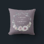 Purple Floral Bridal Wedding Couple Cushion<br><div class="desc">Elegant and chic blush purple flowers create a beautiful wreath. It frames the wedding couple's names and wedding date. The newlyweds will love using this lovely reminder of their special day. This personalised wedding pillow is part of the Blush Violet collection. It contains many gift ideas for the newlyweds, bridal...</div>