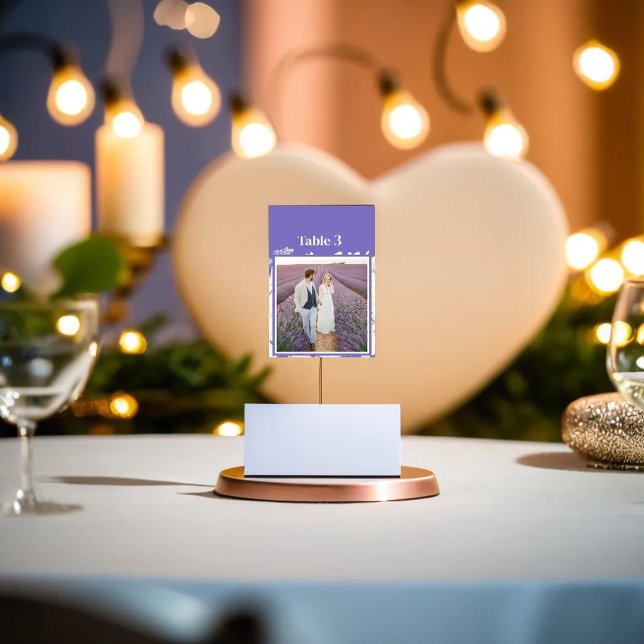 Purple Floral Couple photo with number Table Number (wedding guest table has Purple Floral Couple photo with number Table Number balancing on card holder)