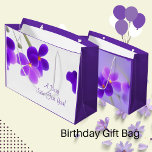 Purple Floral   Large Gift Bag<br><div class="desc">Purple Gift Bag Is customisable on front and back. Dark Purple flowers on light colour background and there is also light purple background with flowers as well. This gift bag is suitable to anyone who loves flowers or appreciates their beauty, such as a friend, family member, or significant other. Beautiful...</div>