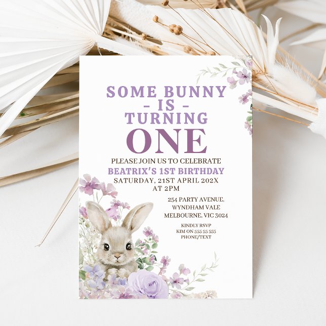 Purple Floral Some Bunny Turning One 1st Birthday Invitation (Some bunny is turning one 1st birthday invitation with fury bunny and purple wildflowers.  Easter)