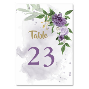purple flowers greenery table number