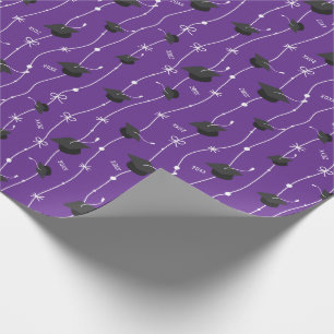 Purple Graduation Caps and Ribbon Wrapping Paper