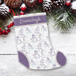 Purple Hand Drawn Snowman Christmas Small Christmas Stocking<br><div class="desc">Hand drawn, cute, snowman seamless pattern in colours of purple, light blue and grey. Snowman has a top hat, scarf, and carrot nose, and he stands on a hill of snow near a Christmas tree with a star. "Merry Christmas!" text in design. Monogram with a first name adding your own...</div>