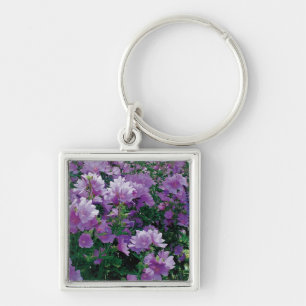 Purple hisbiscus flowers key ring