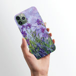 Purple Iris Flowers Claude Monet<br><div class="desc">An iPhone 11 Pro Max Case with the fine art impressionist painting Lilac Irises by Claude Monet from 1914-1917 of vivid purple iris in a meadow.</div>