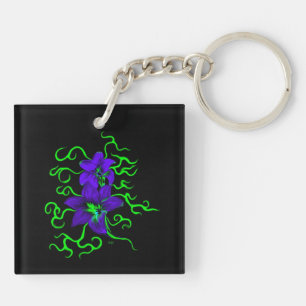 purple lily flower on black key ring