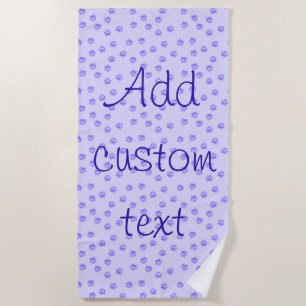 Purple pawprints beach towel