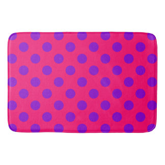 Purple polka dots on cerise bath mat