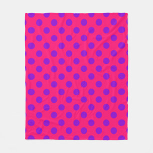 Purple polka dots on cerise fleece blanket