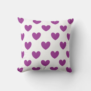 Purple polka hearts on white cushion