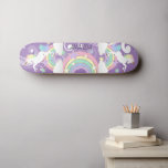 Purple Rainbow Unicorn Skateboard<br><div class="desc">Unicorn Skateboard featured with a purple background and colourful rainbows and unicorns ready for you to personalise. ✔NOTE: ONLY CHANGE THE TEMPLATE AREAS NEEDED! 😀 If needed, you can remove the text and start fresh adding whatever text and font you like. 📌If you need further customisation, please click the "Click...</div>
