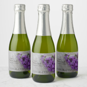 Purple stock flowers on lace sparkling wine label