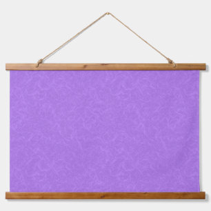 Purple textured surface with swirling pattern hanging tapestry