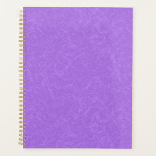 Purple textured surface with swirling pattern planner