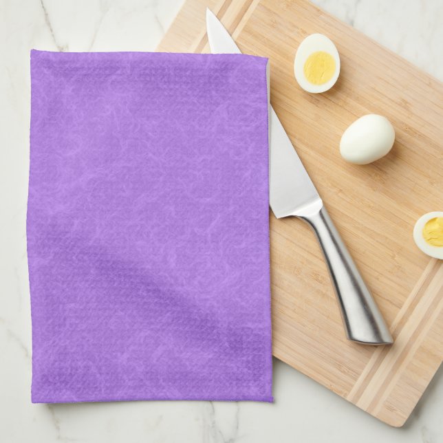 Purple textured surface with swirling pattern tea towel (Quarter Fold)