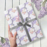 Purple Vintage Winking Santa Claus Christmas Gift Wrapping Paper<br><div class="desc">custom roll of holiday wrapping paper adorned in a unique vintage and adorable retro graphic of santa winking wearing a pretty pastel dusty lilac purple coloured hat,  featured in a seamless pattern print format. and maintains a monochromatic colour pallet</div>