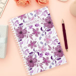 Purple Watercolor Floral Personalised  Planner<br><div class="desc">Create a personalised haven for your plans and dreams with this customisable planner, adorned in a captivating watercolor floral design. The soft purple hues create a serene backdrop for your daily musings, while the option to add your name or initials makes it uniquely yours. Stay organised and inspired with this...</div>