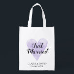 Purple watercolor heart reusable wedding tote bag<br><div class="desc">Purple watercolor heart reusable wedding tote bag for groceries, shopping, gifts, goodies and more. Vintage water colour painting love symbol with stylish handwritten brush script typography text. Personalizable favour for wedding, engagement, anniversary, bachelorette party etc. Create your own for bride and groom, bridesmaid, maid of honour, flower girl, mother of...</div>