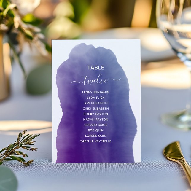 Purple watercolor Table Number Seating Chart (Purple watercolor table card with modern script and guest names.)