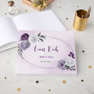 purple white flowers greenery wedding guest book