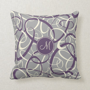 purple white loops on grey geometric pattern cushion