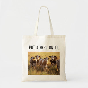 Put a herd on it. tote bag